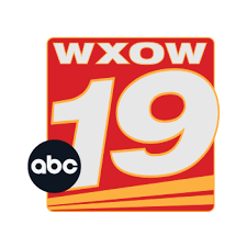 orange background with 19, ABC and WXOW