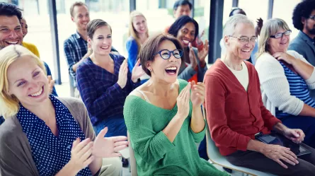 Diverse group or individuals sitting together