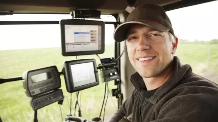 Farmer in tractor cab