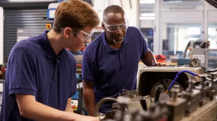 Manufacturing worker learning equipment