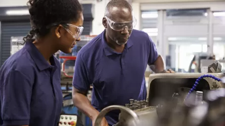 Manufacturing worker learning equipment