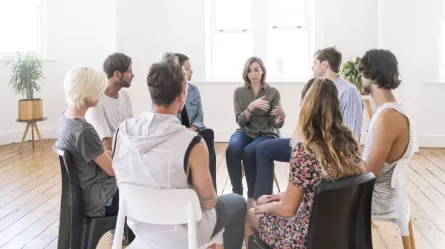 Group of job seekers, gathered in person for a job club meeting.