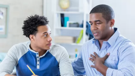 business man mentoring teen