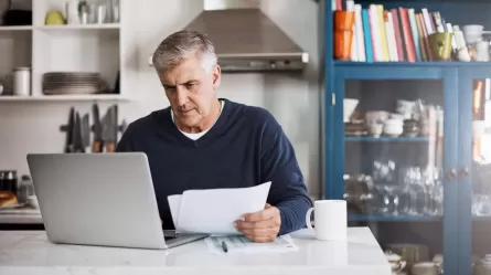 mature man at laptop