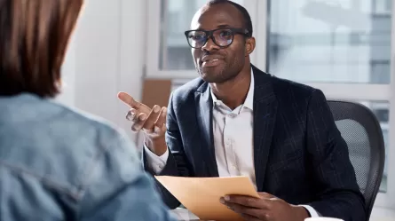man interviewing young employee candidate