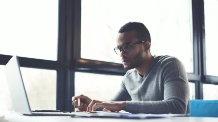young man working at a laptop