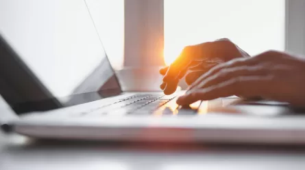 close up hands on a laptop