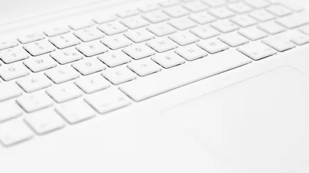 computer keyboard close up featuring white colored keyboard