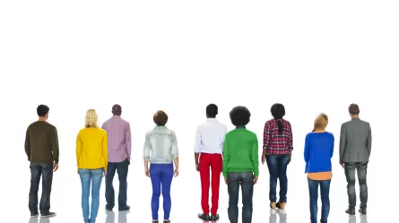 diverse group of people, facing away from camera
