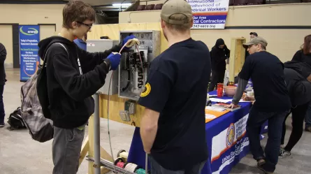 photo of two students engaged in an activity at Construct Tomorrow 2020 in Duluth