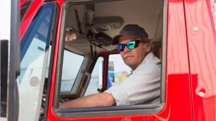 man driving a large truck