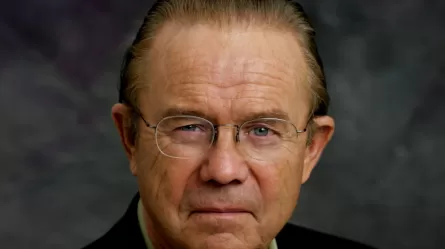 man with glasses looking at camera