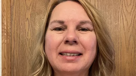 smiling woman with blond hair