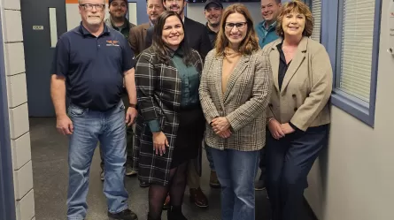 People standing together in an office hallway