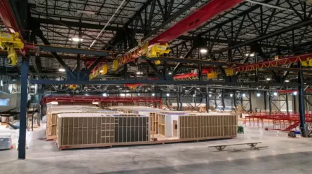 stacks of materials in very large warehouse space