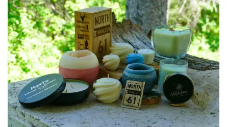 photo of a variety of candles and wood carvings