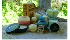 photo of a variety of candles and wood carvings