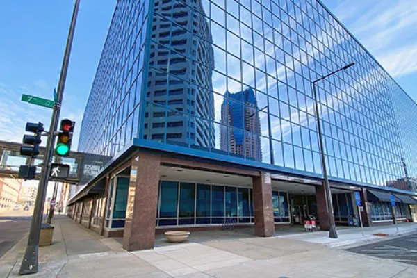 photo of a large building with glass window exterior
