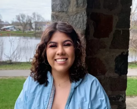photo of Maria who is going to college for a health care career and currently working as a CNA