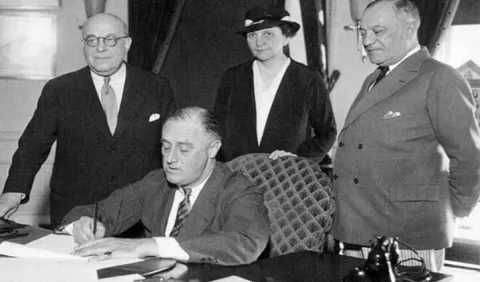 President Roosevelt signing Wagner-Peyser Act