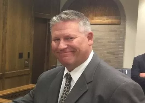 smiling man in a business suit