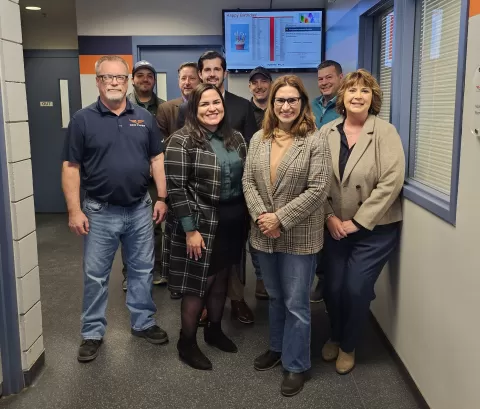 People standing together in an office hallway